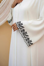 Ivory Grace with Ebony Petals Abaya